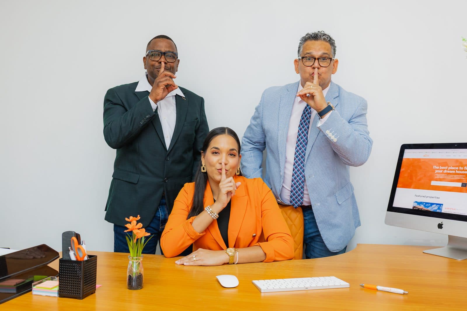 The Objective Realty team keeping a silent listing confidential